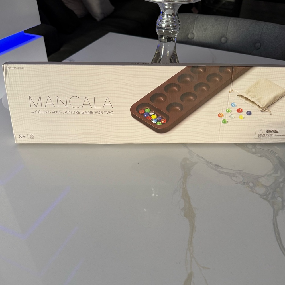Mancala game for 2. Nib nice gift